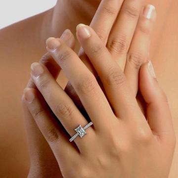 Classic Emerald Cut Diamond Ring with Four Claws