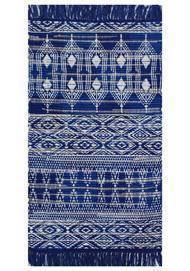 Manufacturer and exporter of designer Custom Made Rugs, Poufs Manufacturers and Exporters in India