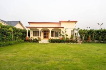 Is it right to buy a farmhouse in Greater Noida?
